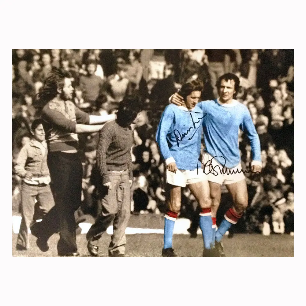 Denis Law & Mike Summerbee dual signed "The Backheel" photo.
