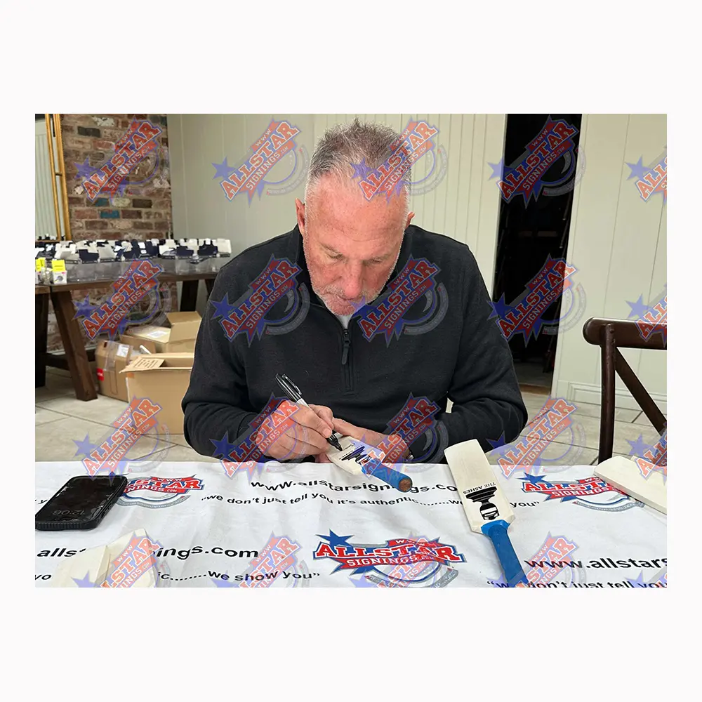Ian Botham signed Ashes cricket mini bat