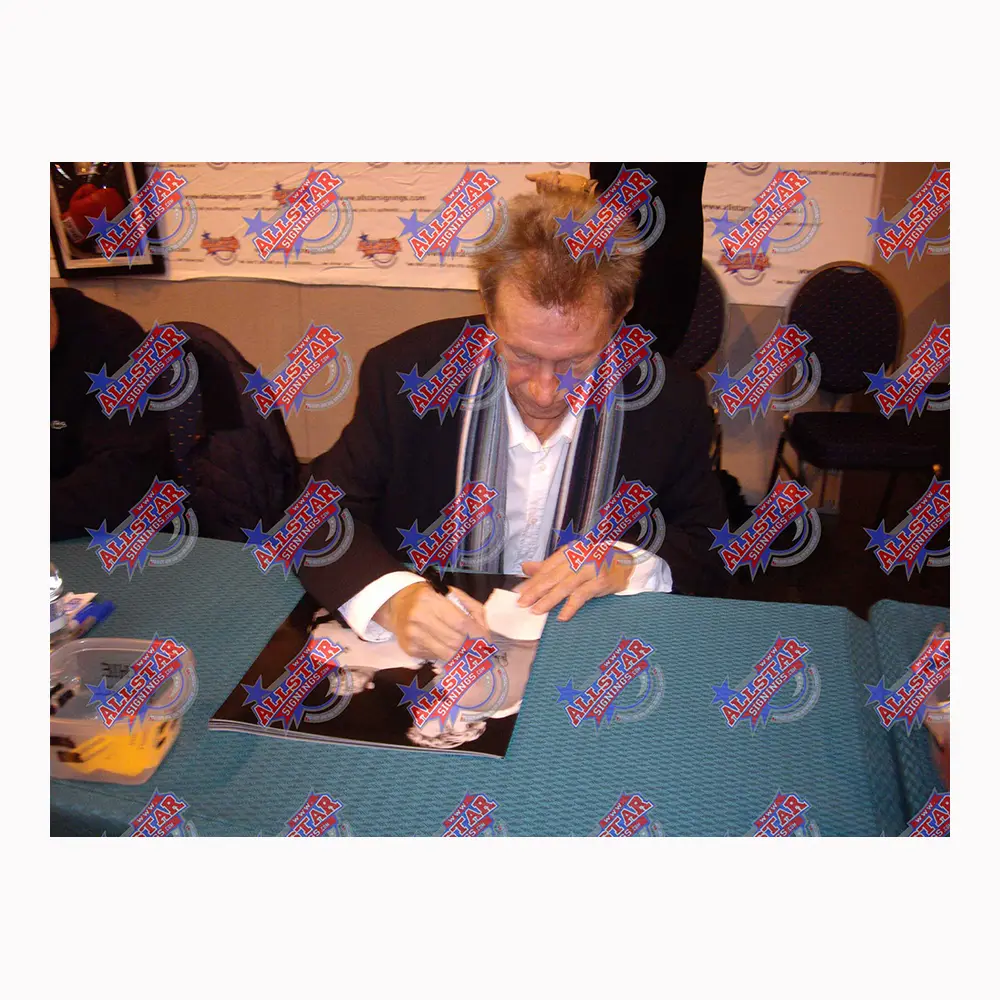 Eusebio & Denis Law dual signed photo