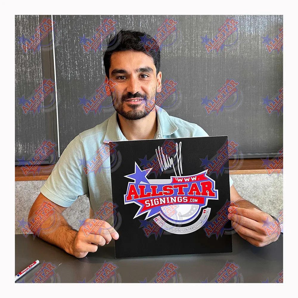 Ilkay Gundogan signed Champions League winners photo(2)