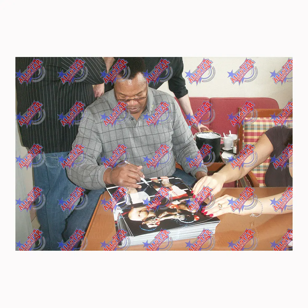 Larry Holmes signed 16x12 photo vs Muhammad Ali