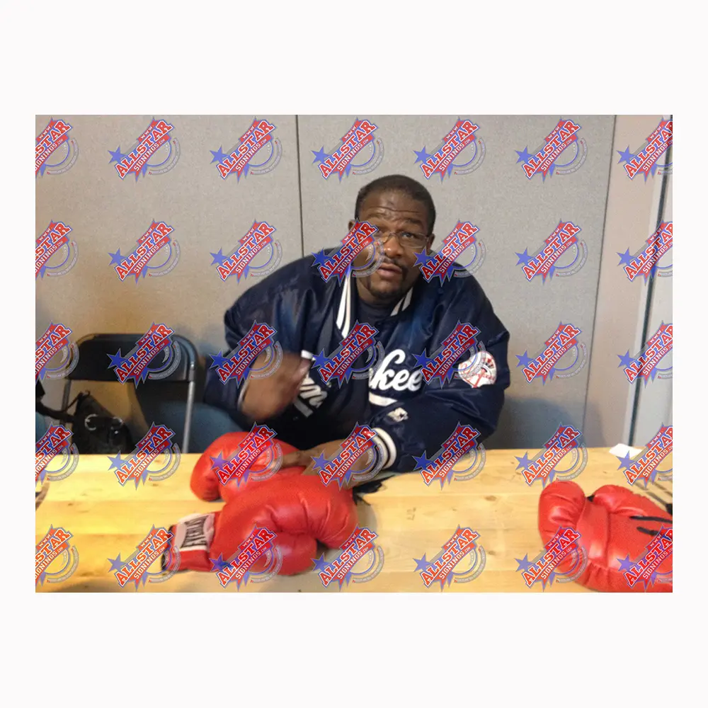 Riddick Bowe signed boxing glove