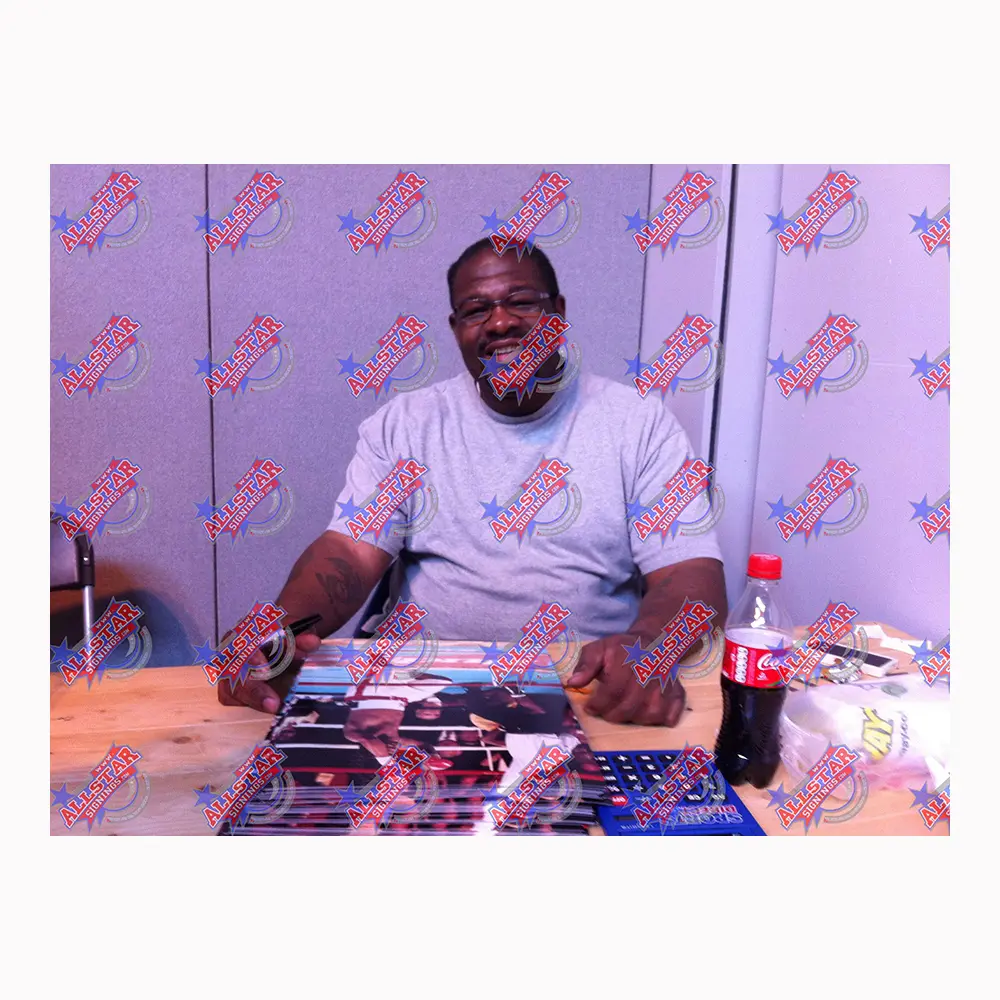 Riddick Bowe signed 16x12 photo vs Holyfield