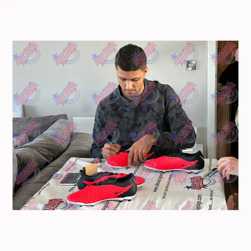 rodri signed Nike football boot
